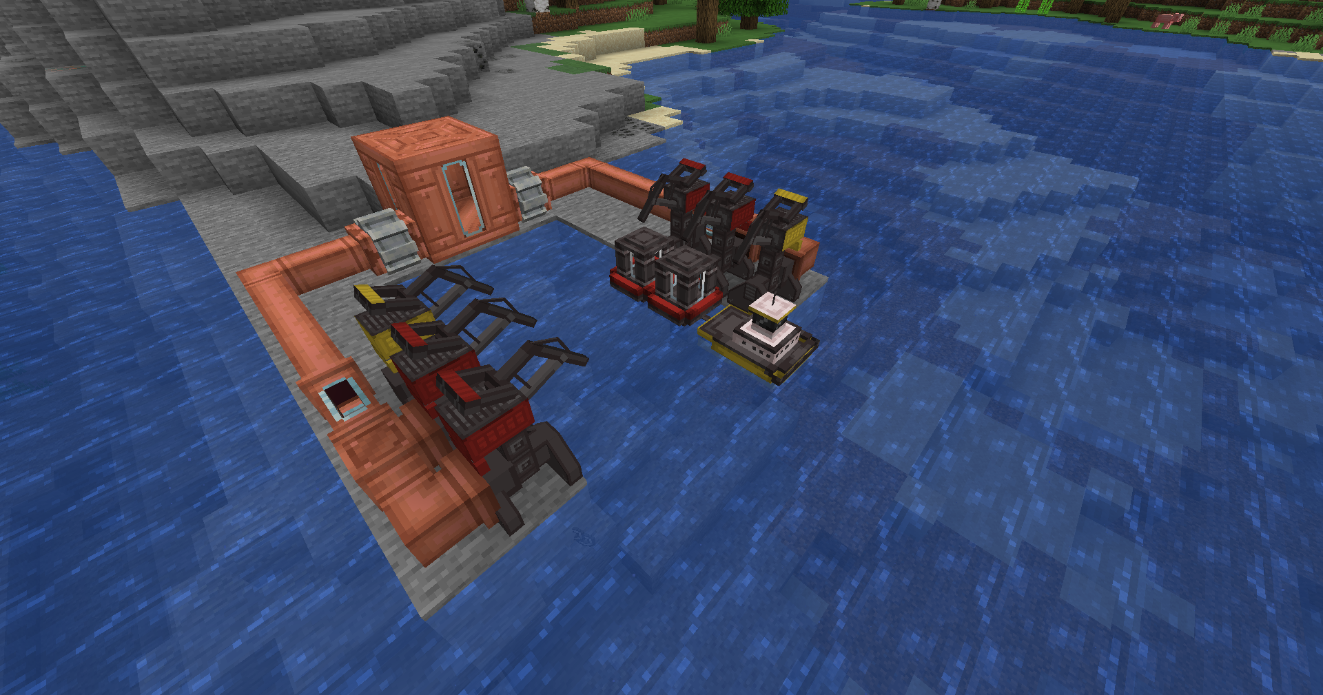 A tug and three barges aligned with matching coloured Docking Stations